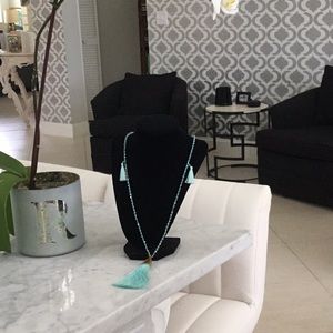 Turquoise crystal necklace silk like tassels.